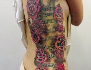 Roses and music notes tattoo