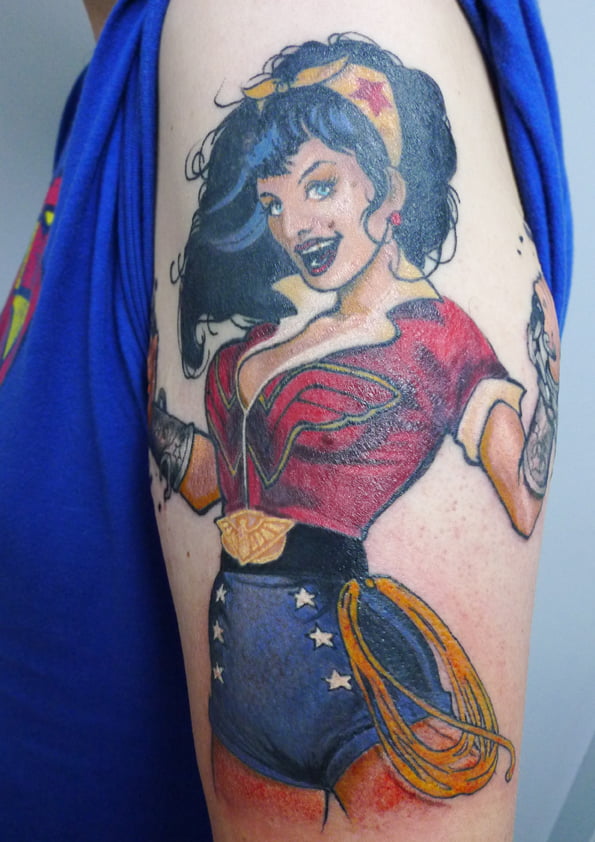 I wanted a Wonder Woman tattoo  the artist said she could do better than  my sketch its the ugliest tattoo ever  The Sun