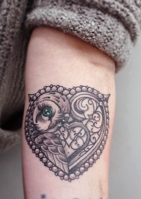 Heart and owl tattoo